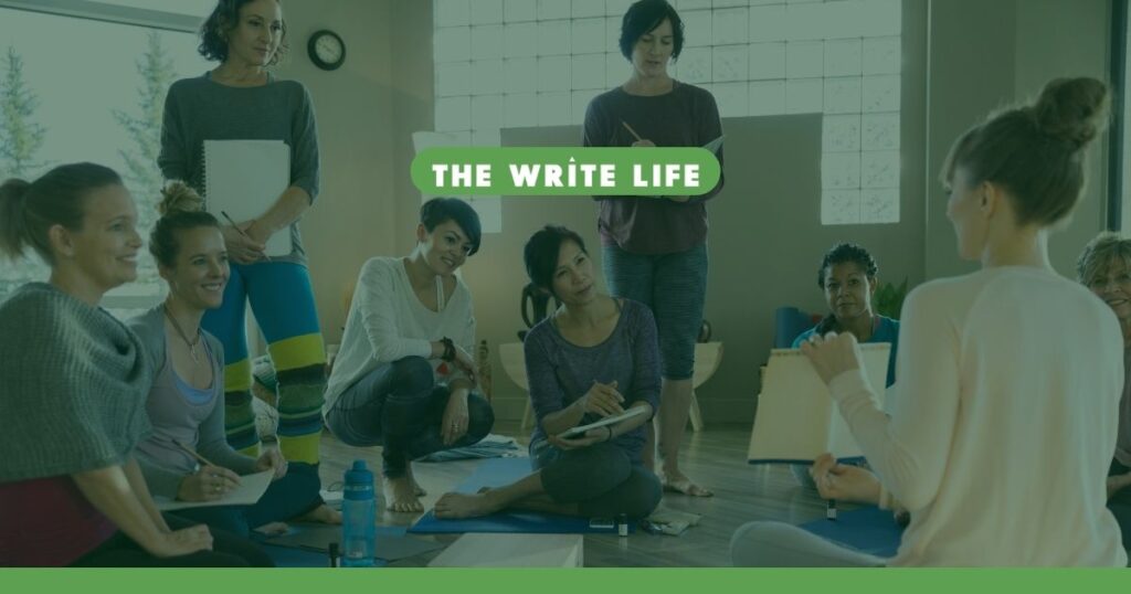 A stock image of a group of females sitting and standing, some looking at the presenter and some writing in notebooks. This is to illustrate the post with women's writing retreat options.